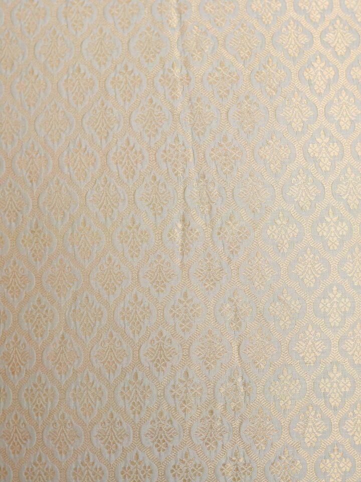Awadh boota pista Banarasi handloom silk cushion cover, detail shot of fabric texture
