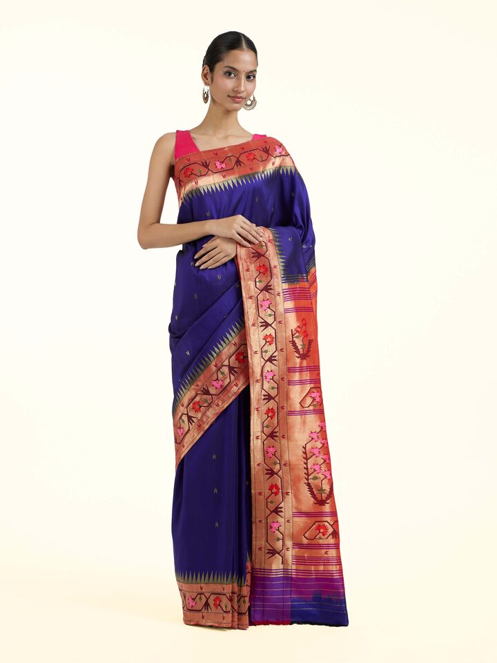 Front view of blue silk Paithani saree with traditional motifs