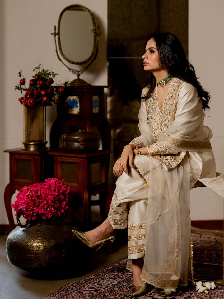 Angled view of the Off-white Silk Long Yoke Hand Embroidered Kurta Set (2 Pcs)