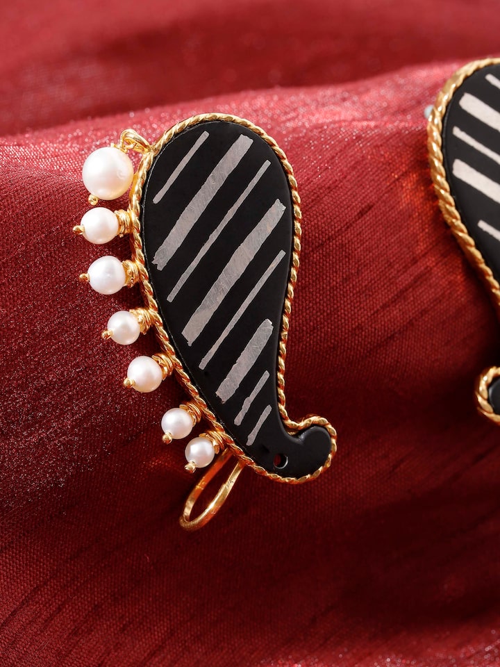 alternate lifestyle view of bidri silver ear cuffs