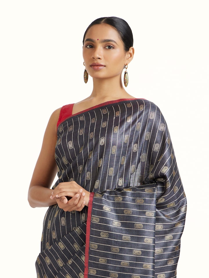 Angled view of Blue Tussar Silk Odisha Ikat Saree revealing the depth of its color and intricate pattern
