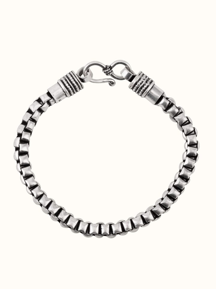 Front view of silver smithing men’s flexi bracelet with structured handcrafted links