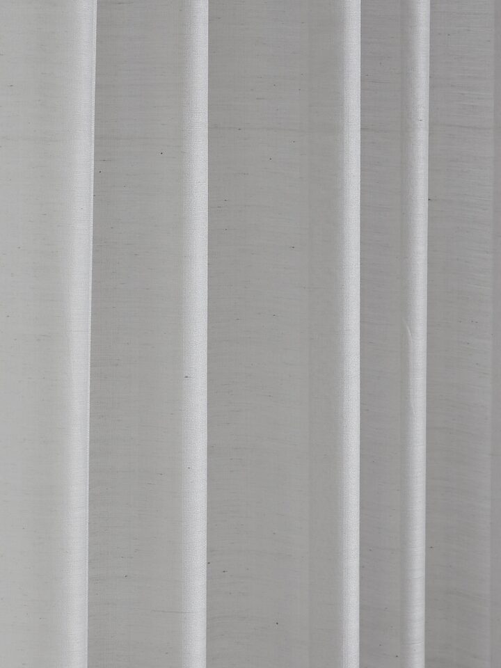 Close-up showing handwoven texture and tonal stripes of the Maheshwari silk cotton curtain