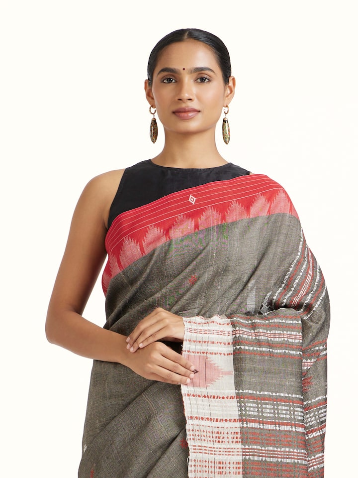Angled view of Brown Cotton Tussar Silk Kotpad Saree revealing the depth of its color and intricate pattern
