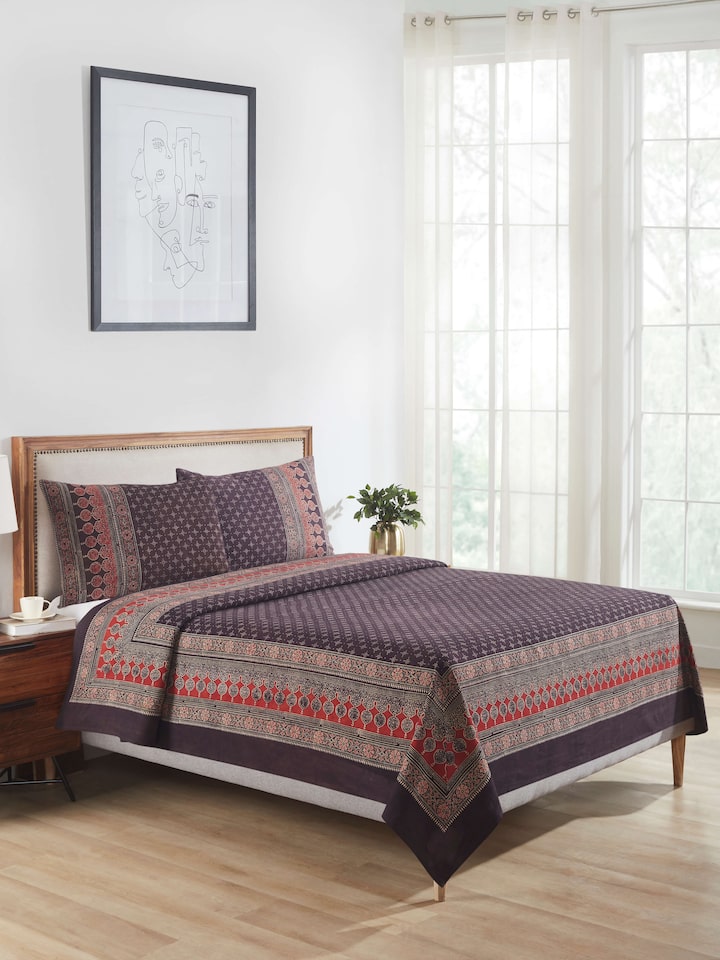 Close-up of Sindh multicolour jaal cotton ajrakh block printed king bedspread set (3 pcs) highlighting the detailed ajrakh block print and rich colors.