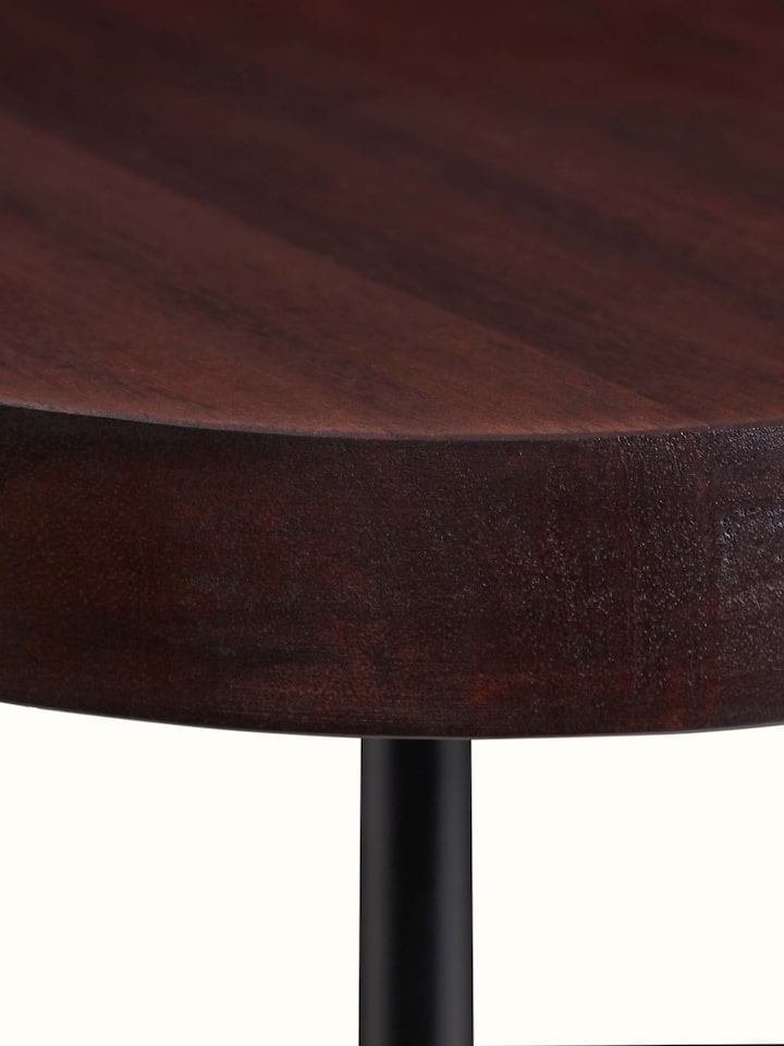 close-up view of marble stone carving walnut finish end and side table detailing