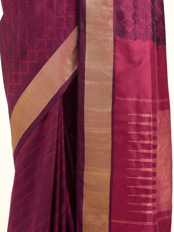 Detail view of purple mulberry silk ikat saree showing silk texture and craftsmanship