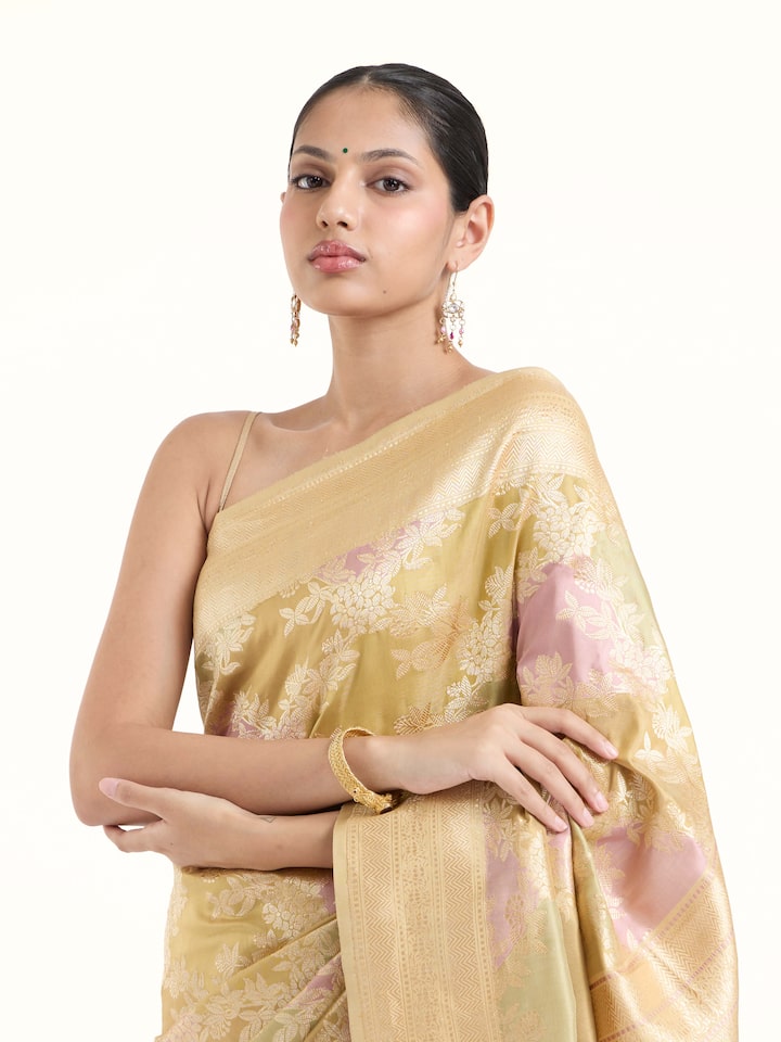 Angled view of silk rangkat banarasi saree highlighting traditional zari work