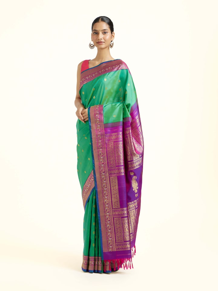 Side view of Green Silk Gadwal Saree highlighting the woven border detailing