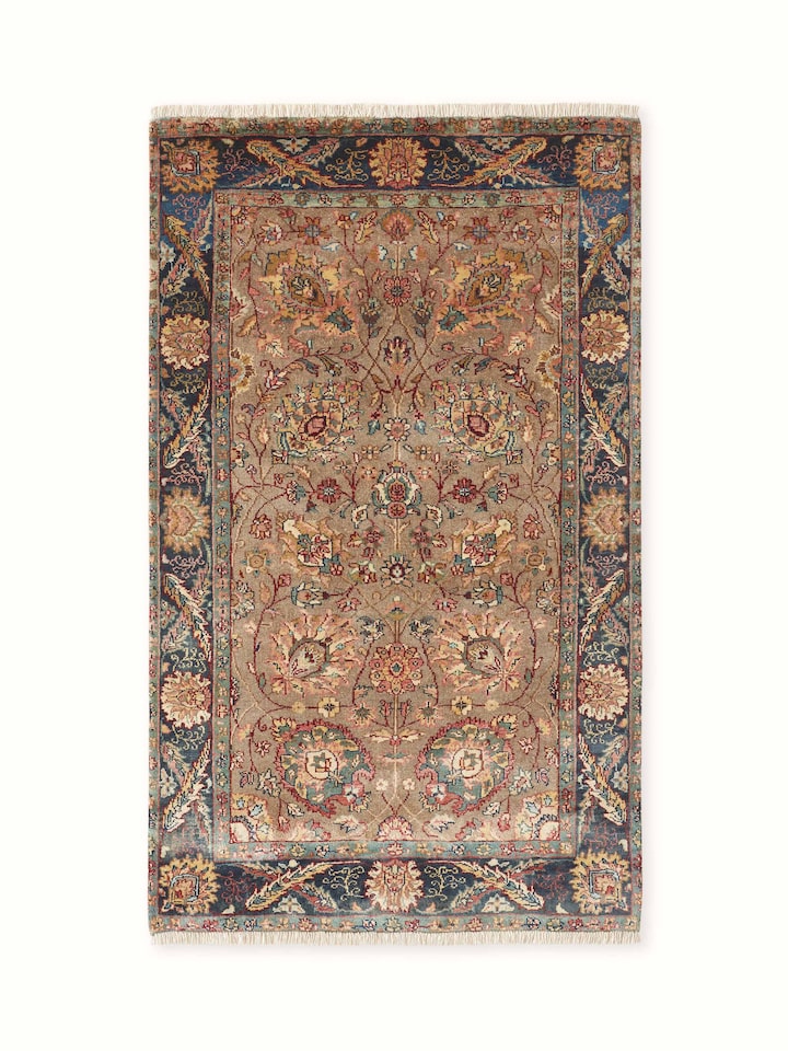 Front view showing the rich brown and blue hues in a traditional Ziegler pattern, handcrafted from Jaipur wool