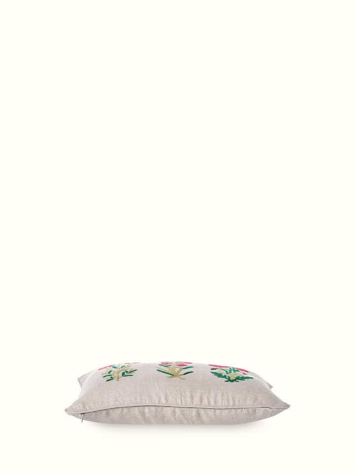 Angled shot emphasizing the texture and intricate hand embroidery details