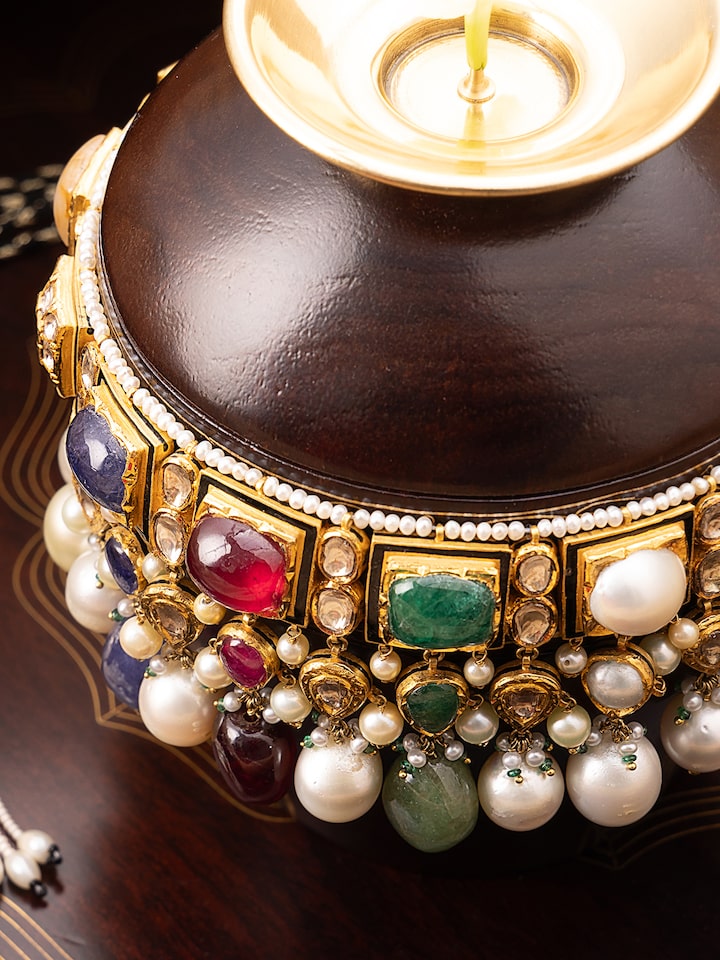 Detailed front view of Nafeesa Jadau 18 Karat Gold Navaratna Choker highlighting its exquisite gemstone arrangement