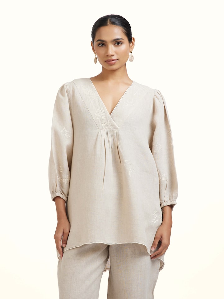 Close-up view of Natural Chikankari Linen Top highlighting the fabric texture and embroidery detail