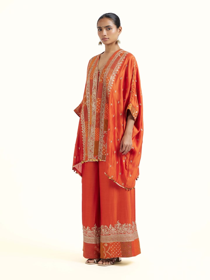 Side view of rust silk hand embroidery co-ord set showcasing coordinated fit