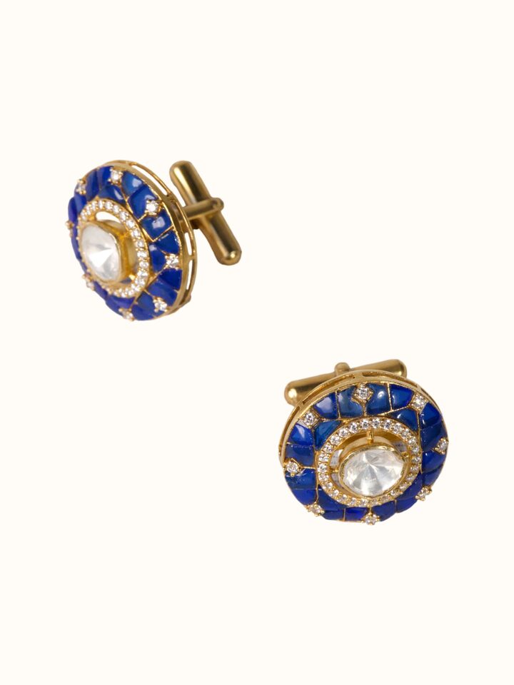angled view of silver smithing gold plated cufflinks set