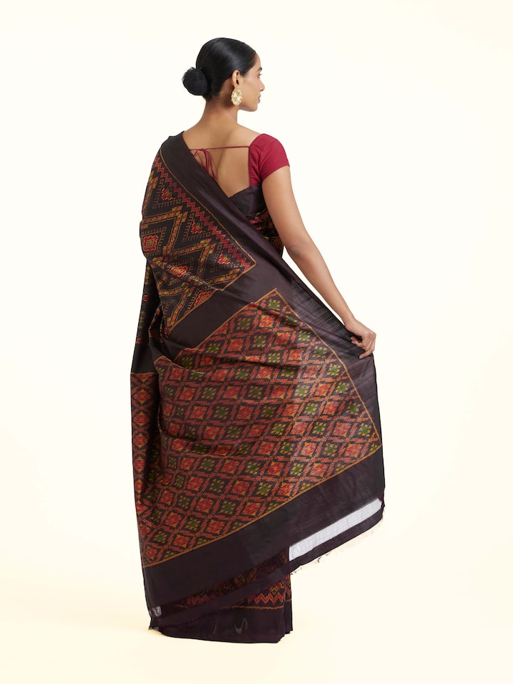 Back view of Brown Pochampally Combodia Ikat Silk Saree emphasizing the overall design and fine details