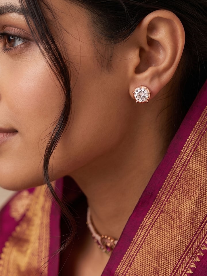 Close-setting 22 Karat Gold Studs by Swadesh
