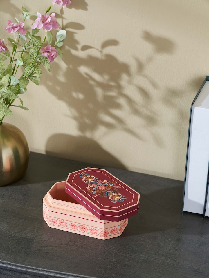 Close-up view of the marquetry papier-mache and wood decorative container, highlighting the detailed craftsmanship.