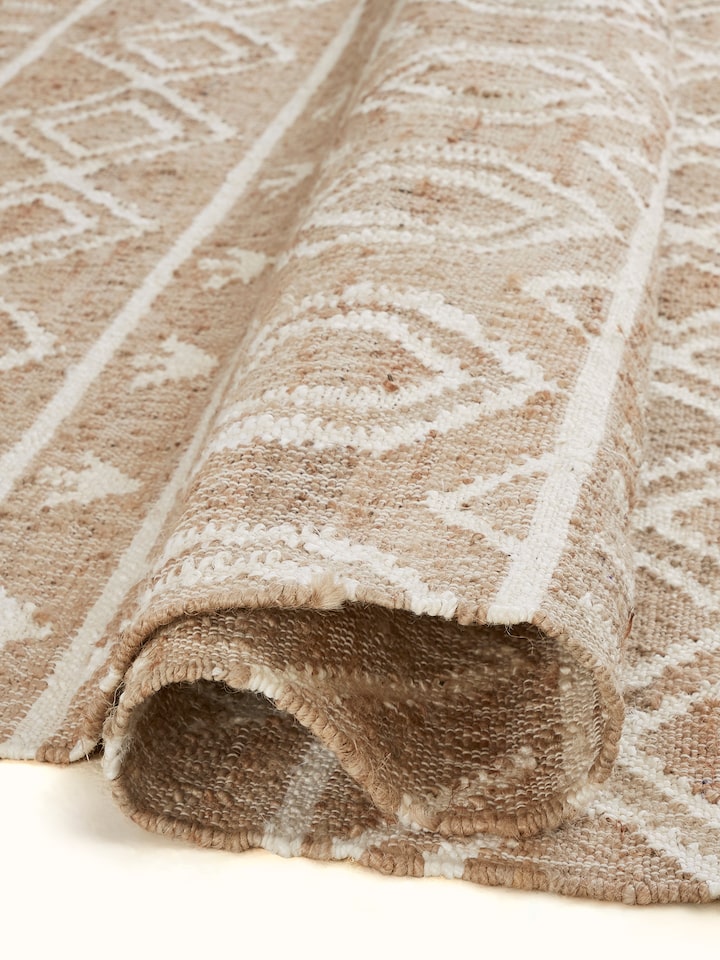 Detailed shot of Graphic Geo Beige Jute Natural Fibre Rug showcasing the woven pattern and natural fiber.