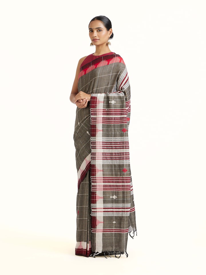 Side view of Brown Cotton Tussar Silk Kotpad Saree highlighting the detailed craftsmanship and elegant silhouette