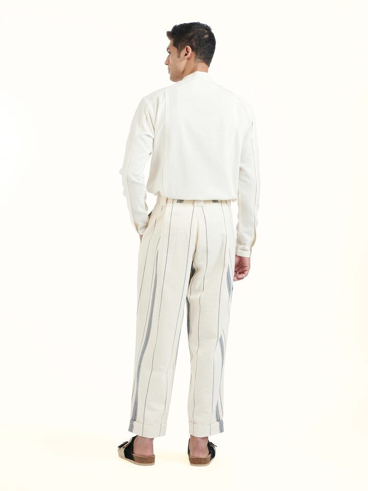 Back view of ivory cotton handloom straight pants displaying straight cut design