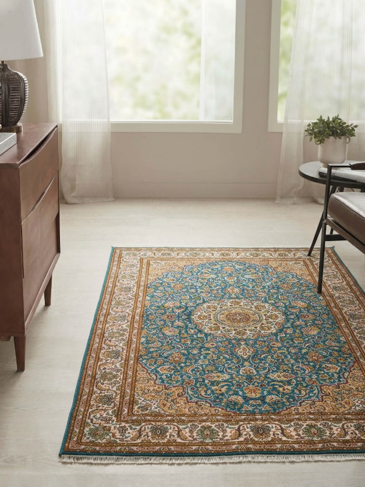 Traditional Persian blue Kashan Kashmir silk hand-knotted carpet with intricate floral motifs