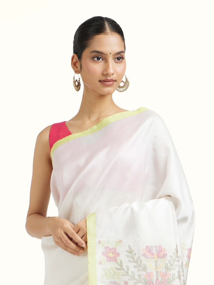 Close-up view of White Silk Jamdani Handloom Saree highlighting the handwoven motif and texture