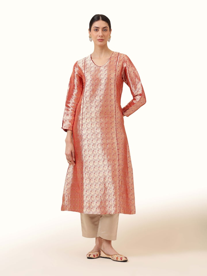 Red Silk Banarasi Kurta worn by model in front-facing pose, showcasing rich brocade weave and traditional silhouette.