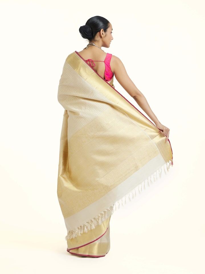 Back view of Beige Kancheepuram Silk Zari Saree emphasizing the overall design and fine details