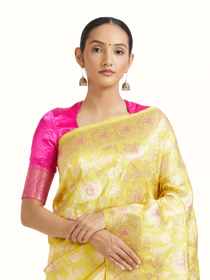 Angled view of the Yellow Mulberry Katan Silk Banarasi Saree