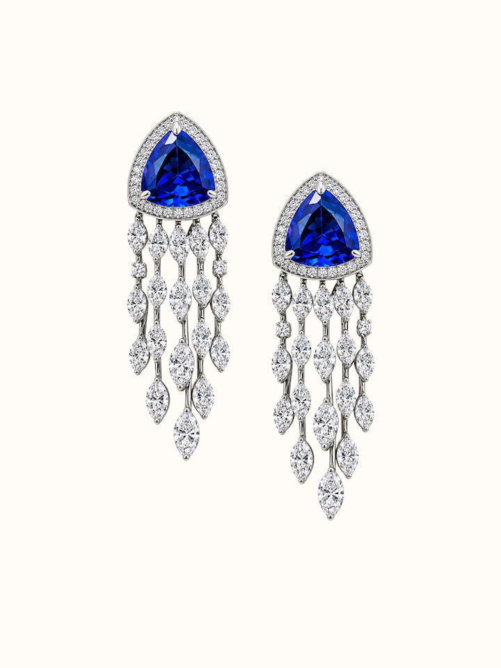 Detail view of Open Setting 14 Karat White Gold Set with Diamonds and Sapphires highlighting the stone setting and metalwork detail