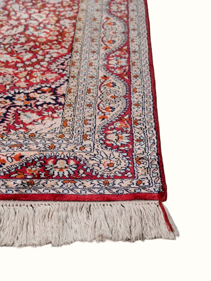 Close-up view of Traditional Persian Red Kashan Kashmir Silk Hand-Knotted Carpet highlighting the hand-knotted weave and motif detail