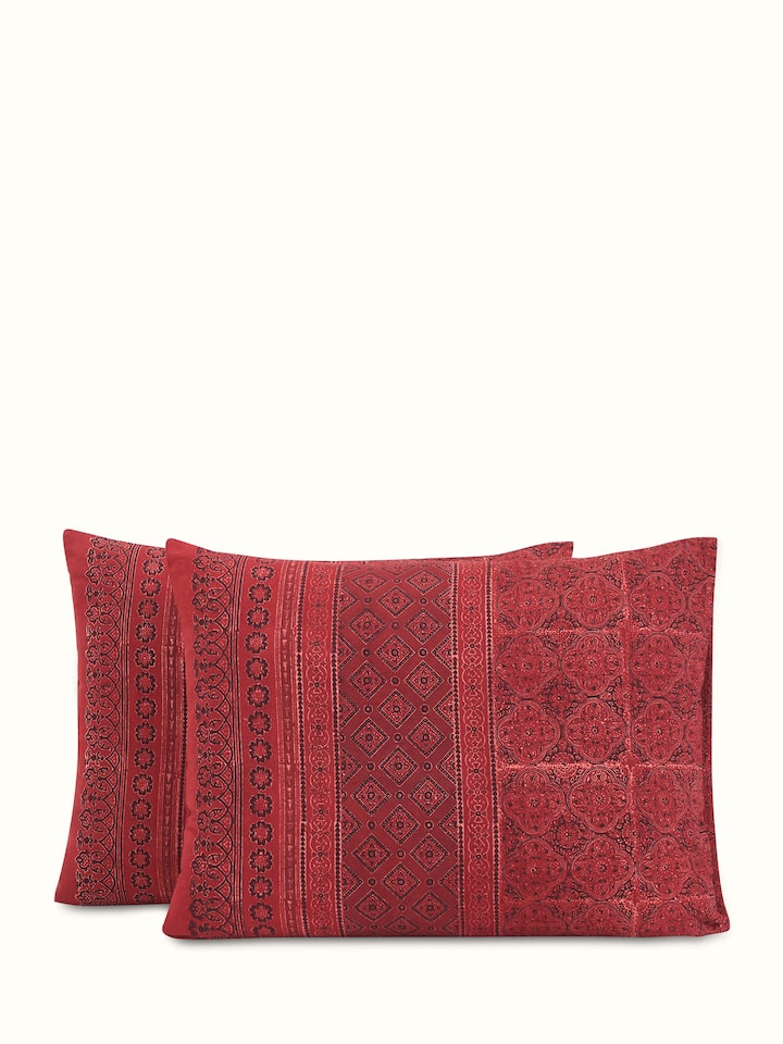 Detailed view of Sindh maroon jaal cotton ajrakh block printed king bedspread set (3 pcs) showing the intricate block print and fabric texture.