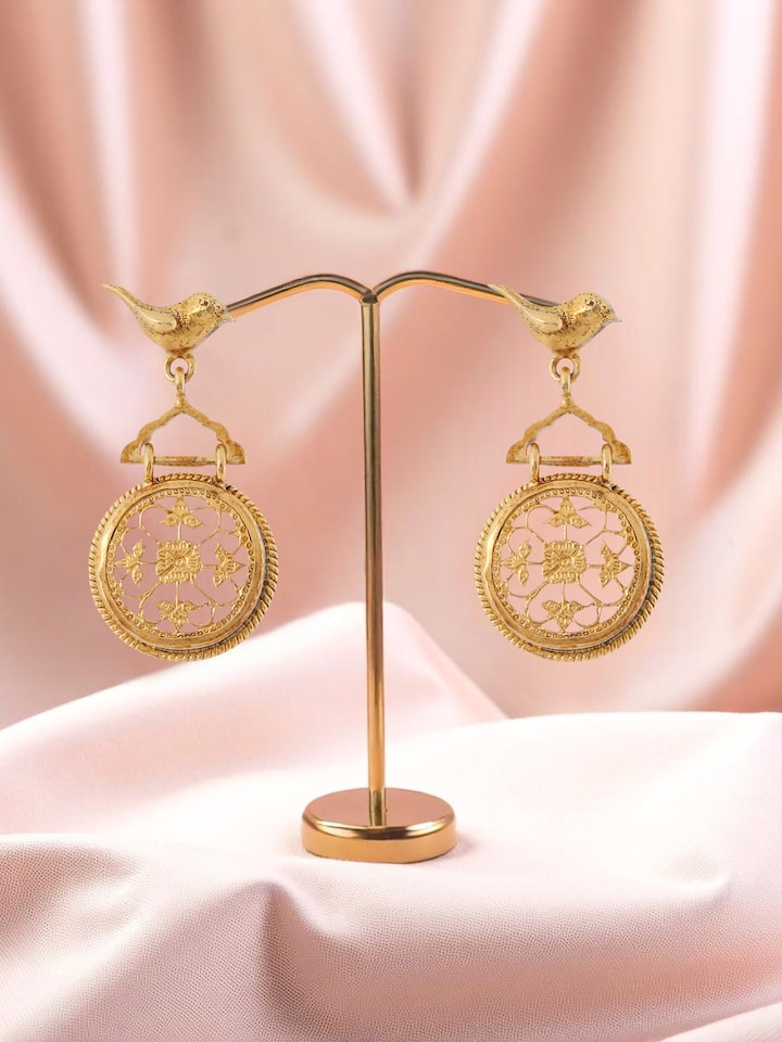 Styled view of Thewa Silver Drop Earrings worn on the ear, showing how it looks styled