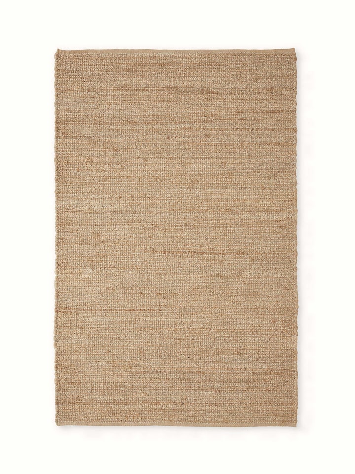 Front view showing the full 4x6 ft solid textured beige rug made from jute and wool