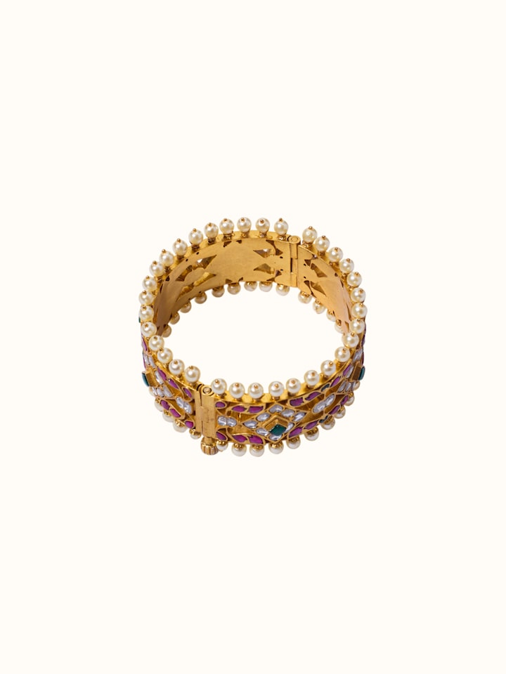 Detail view of Jadau Silver Bangle highlighting the stone setting and metalwork detail, from a different angle