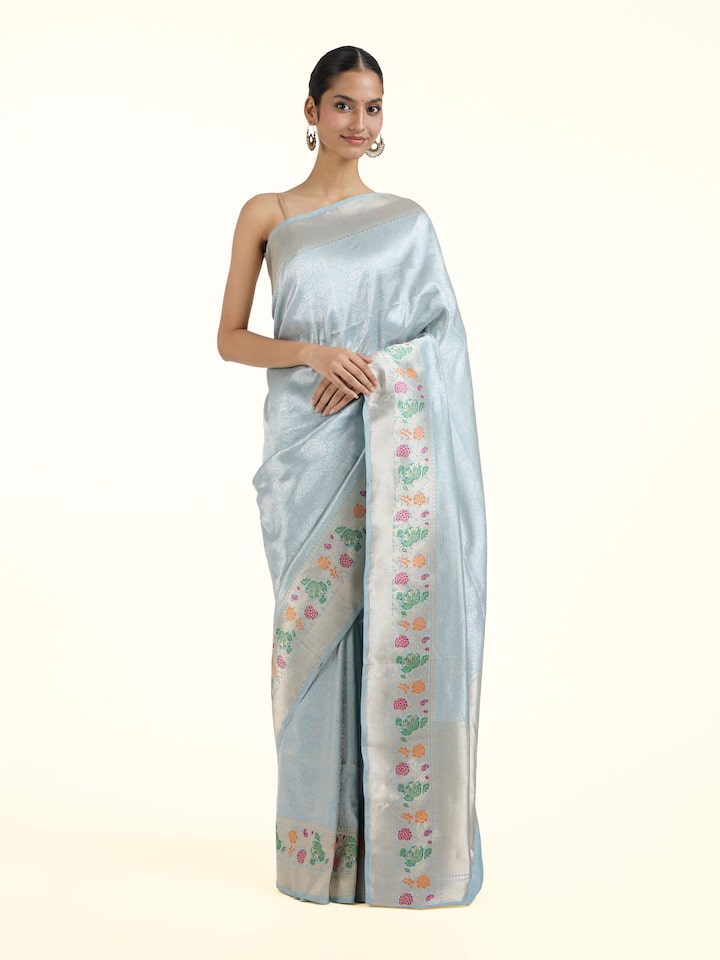 Front view of Ivory Banarasi Kadhwa Silk Saree showcasing its traditional craftsmanship and design
