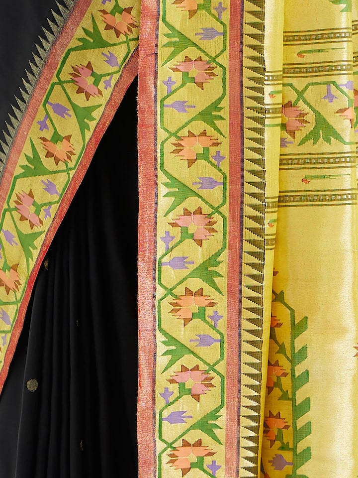 Detail view of black silk Paithani saree showing silk texture and zari craftsmanship