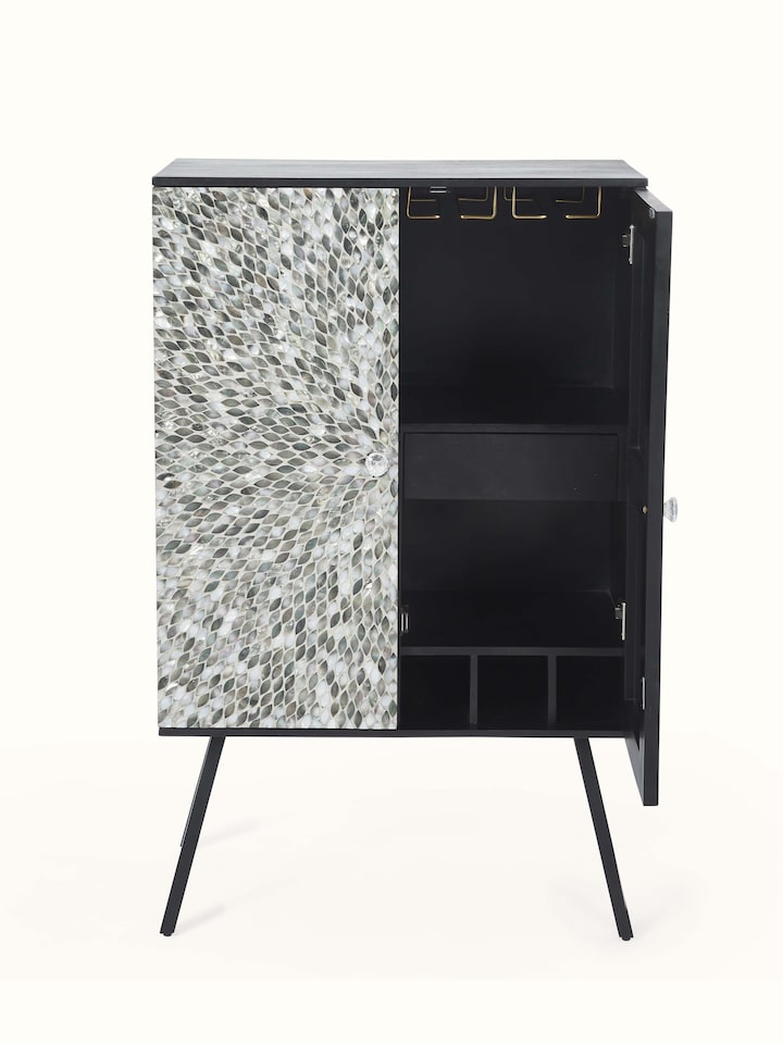 Close-up view of the mother-of-pearl inlay details on the mango wood bar cabinet, focusing on the delicate patterns and design