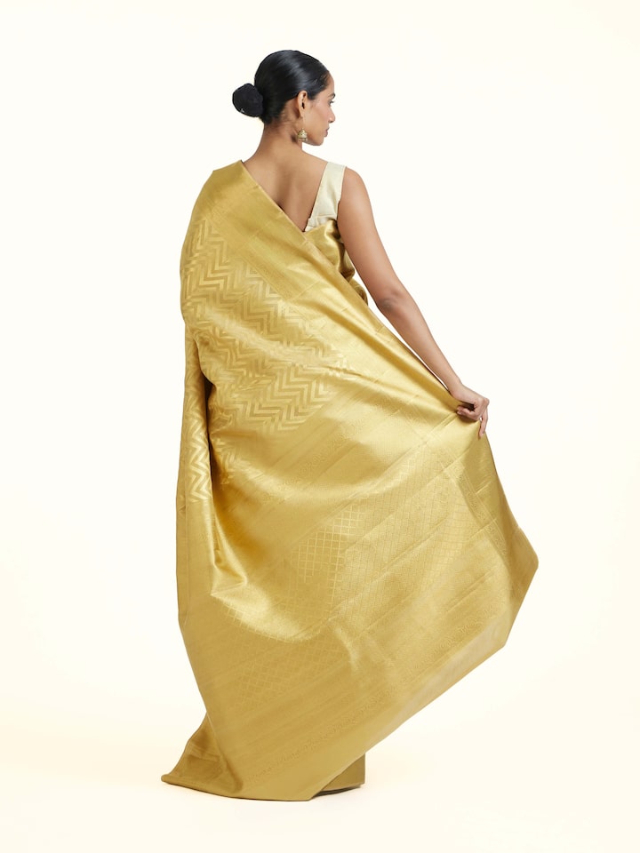 Back view of Gold Kancheepuram Silk Zari Saree emphasizing the overall design and fine details