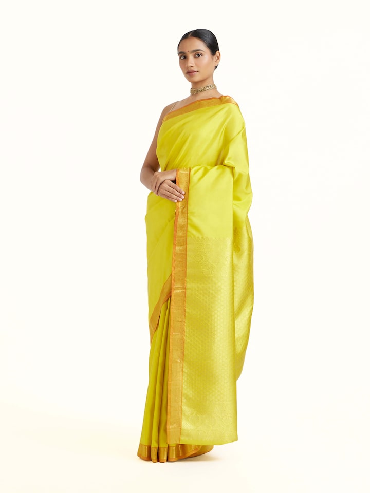 Side view of Mustard Silk Dharmavaram Saree highlighting the detailed craftsmanship and elegant silhouette
