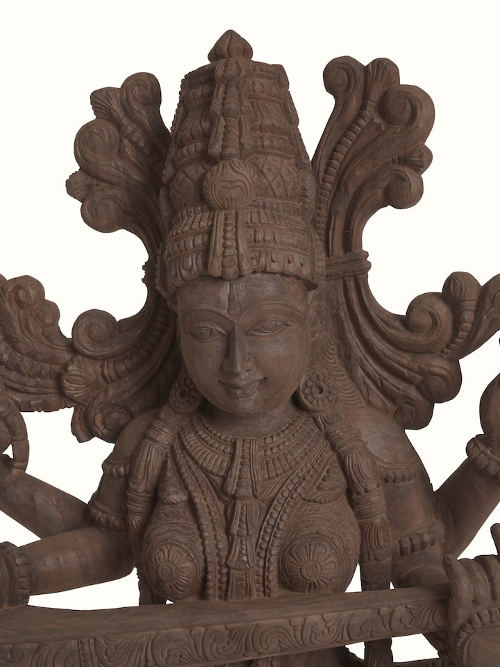 Detailed view of the Wood Carved Sitting Saraswati Idol