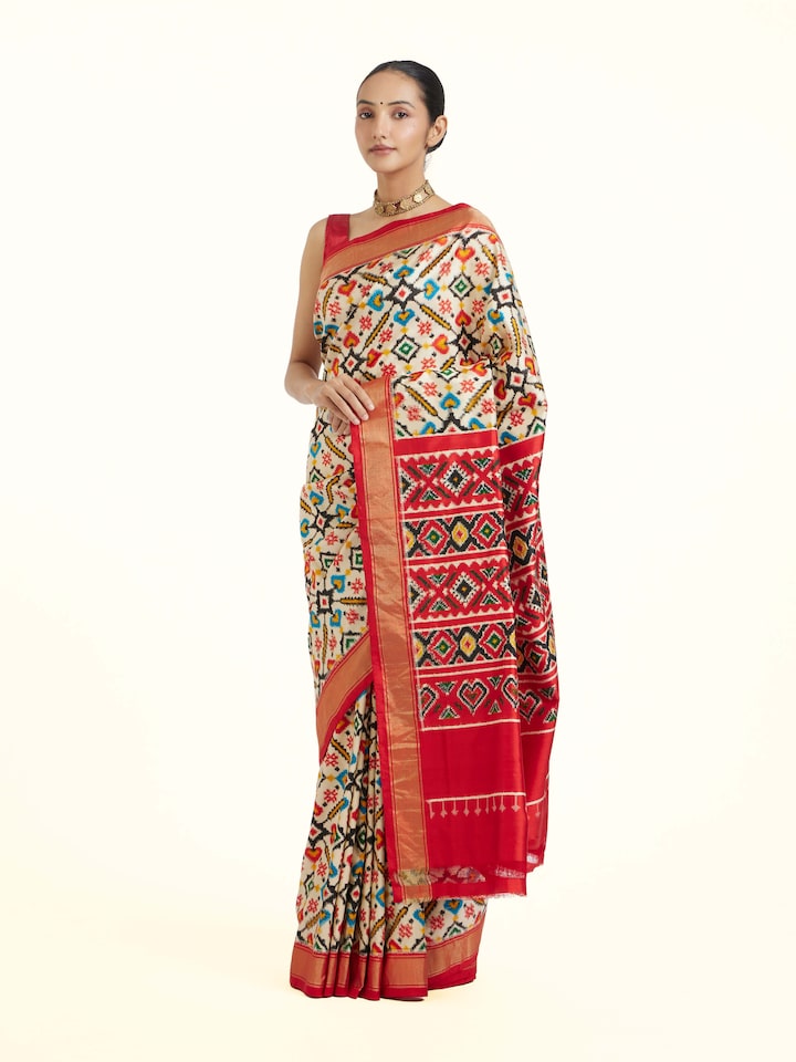 Side view of Off-White Pochampally Double Ikat Saree highlighting the detailed craftsmanship and elegant silhouette