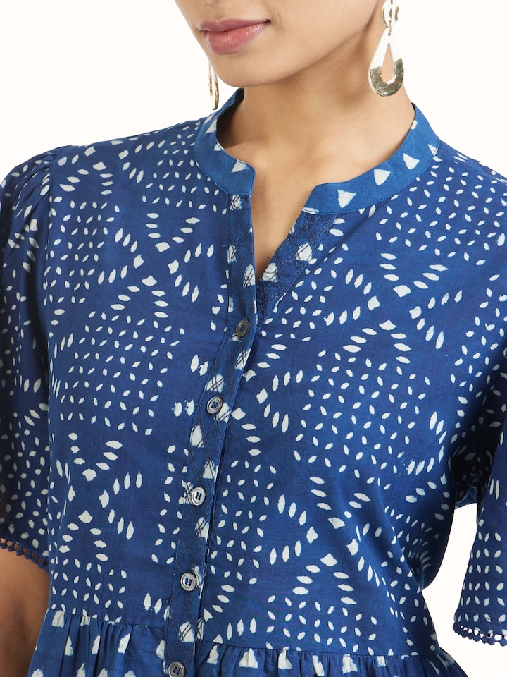 Detail view of Aarnika cotton dabu block printed dress showcasing fabric texture