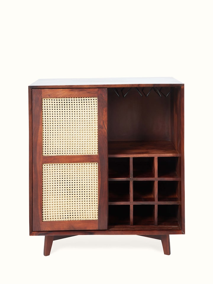 Side view of the Sheesham wood and cane bar cabinet, showing the depth and storage capacity.
