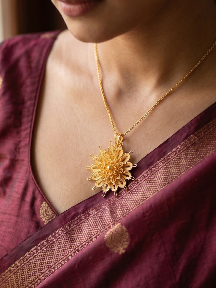 Styled view of Silver Smithing Pendant worn around the neck, showing how it looks styled, from a different angle