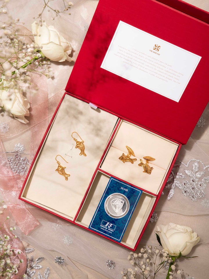 Lifestyle view of silver filigree silver his hers gift box