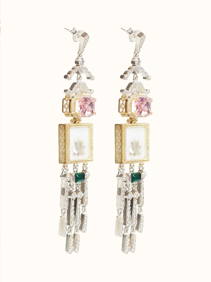 angled view of parchinkari silver drop earrings