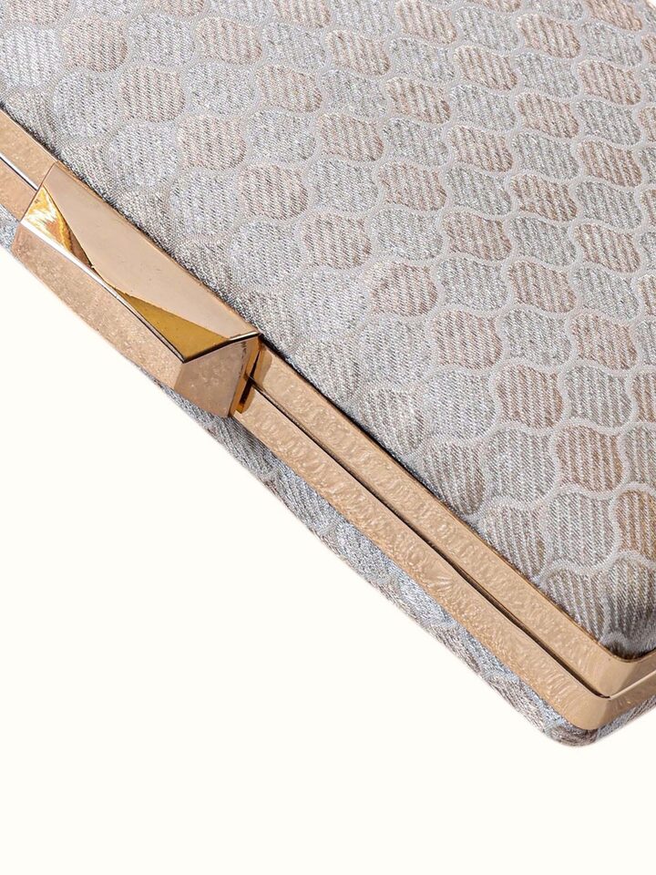 Detail view of the Silver Handwoven Brocade Clutch