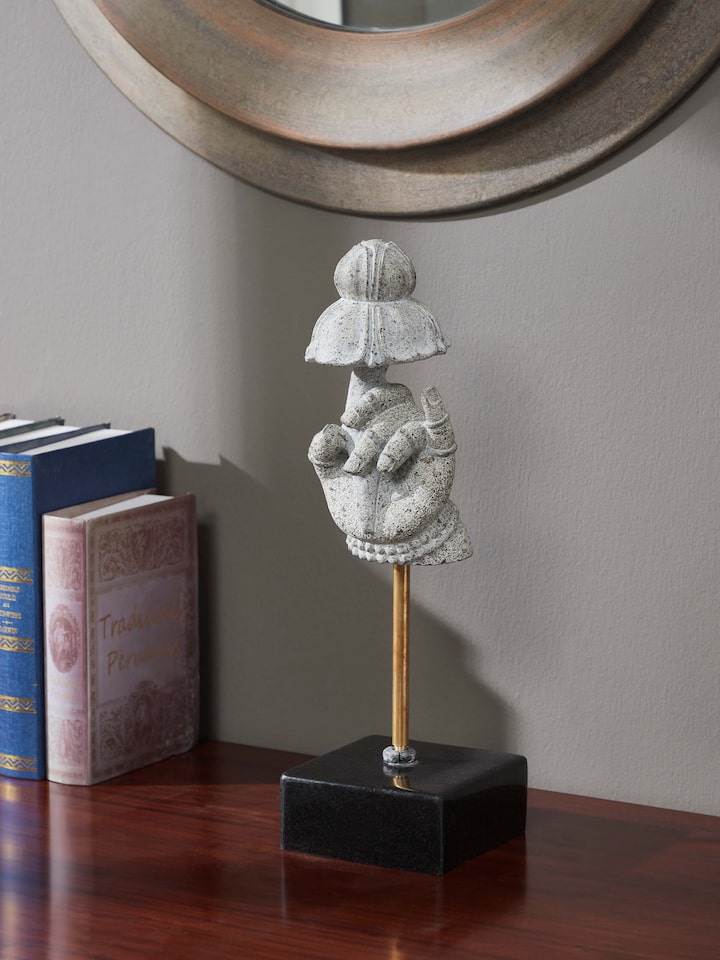 Left-side view of the Stone Carved Deity Hand Sculpture